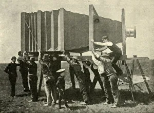 Teamwork Gallery: Focussing The Gigantic Camera For Work, 1901. Creator: Unknown