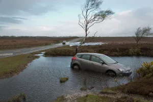 Focus Prints: Ford Focus in flooded ditch after losing control on wet road 2012