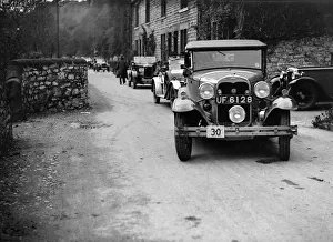 Ford Model A of EAL Midgely and Morris Cowley at the MCC Sporting Trial, 1930. Artist: Bill Brunell