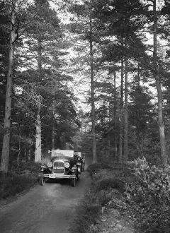 Junior Car Club Prints: Ford Model A of FH Grain competing in the JCC Half-Day Trial, 1930. Artist: Bill Brunell