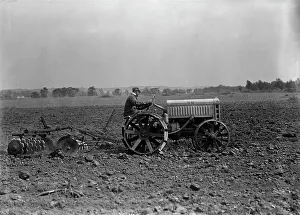 Tractor Prints: Ford Tractor, 1917. Creator: Harris & Ewing. Ford Tractor, 1917. Creator: Harris & Ewing