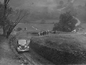 Ford V8 saloon of F Allott competing in the MCC Sporting Trial, 1935. Artist: Bill Brunell