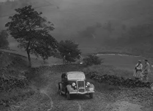 Ford V8 saloon of WS Millar competing in the MCC Sporting Trial, 1935. Artist: Bill Brunell