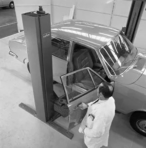 Car Maintenance Gallery: Ford Zodiac on an assymetric lift, Sheffield, South Yorkshire, 1972