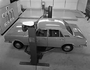 Car Maintenance Gallery: Ford Zodiac on an asymmetric lift, Sheffield, South Yorkshire, 1972