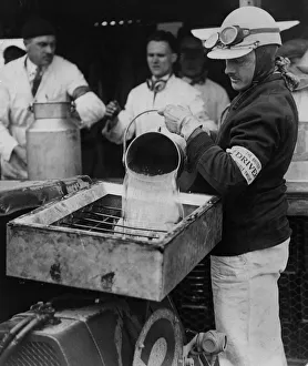 Frank Clement refuelling Bentley at Brookland Double 12 race 1930. Creator: Unknown