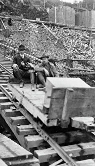 Journalist Collection: Frank G. Carpenter and man sitting on tracks, between c1900 and 1924. Creator: Unknown