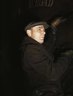 Chicago And North Western Railway Gallery: Frederick Batt, brakeman, on the C & NW RR, at Proviso yard, Chicago, Ill. 1942