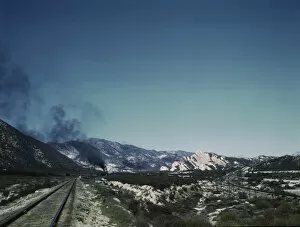 Atchison Topeka Santa Fe Railway Gallery: Freight train going up Cajon Pass through the San Bernardino Mountains, Cajon, Calif. 1943