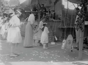 Scissors Prints: French Fete, July 14 (191?). Creator: Bain News Service