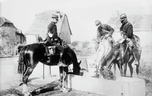 Drinking Trough Prints: French Officers watering horses, between c1914 and c1915. Creator: Bain News Service