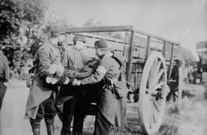 Casualties Prints: French pick up dead near Charleroi, 21 Oct 1914. Creator: Bain News Service