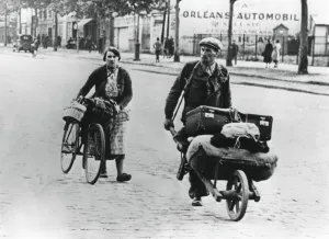 Suitcase Prints: French refugees returning home after the fall of France to the Germans, Paris, July 1940