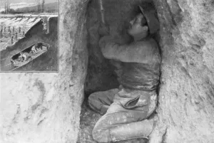 A French sapper digging a tunnel to place a mine under the enemy lines, France, 1915 A French sapper digging a tunnel to place a mine under the enemy lines, France, 1915