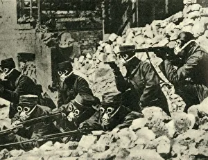 Protective Equipment Prints: French soldiers wearing gas masks, First World War, c1915, (c1920). Creator: Unknown