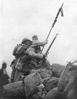 French troops with their regimental flag, the 2nd Battle of Champagne, France, 25 September 1915