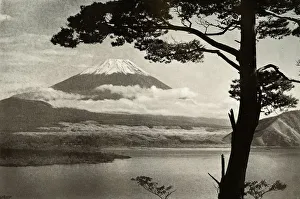 In Lotus Land Japan Prints: Fuji from Lake Motosu, 1910. Creator: Herbert Ponting