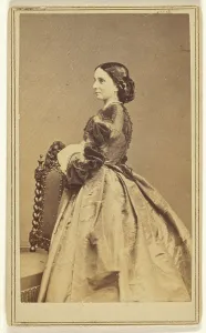 Full-length portrait of an unidentified woman in profile, 1864. Creator: Charles De Forest Fredricks