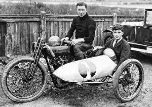 Sidecar Prints: FW Dixon on a Harley-Davidson, with a passenger in the sidecar, 1921