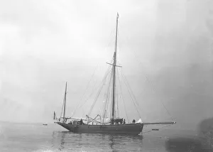 Coral Prints: The gaff yawl Coral at anchor, 1922. Creator: Kirk & Sons of Cowes