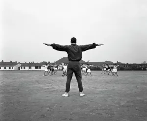 Games master taking a gym class, Airedale school, Castleford, West Yorkshire, 1962