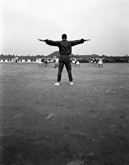 West Yorkshire Gallery: Games master taking a gym class, Airedale school, Castleford, West Yorkshire, 1962