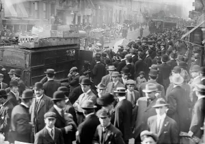 Rubbish Prints: Garbage strike, crowd around carts, 1911. Creator: Bain News Service
