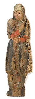 Gardener with pipe and spade, garden figure. Creator: Anon