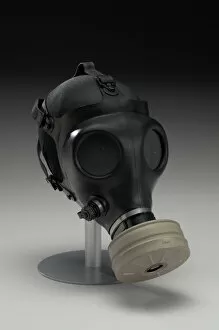 Police Brutality Gallery: Gas mask with filter canister worn at demonstrations in Ferguson, Missouri, 2014
