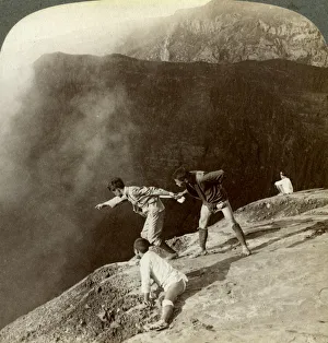 Gaving through sulphurous vapors into the craters depths, Aso-San, Japan, 1904. Artist: Underwood & Underwood