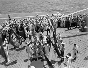 Aircraft Carrier Gallery: Gemini IV crew arrives on the USS Wasp, June 7, 1965. Creator: NASA