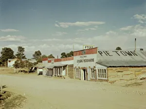 Caf And Xe9 Prints: General Merchandise store, Main Street, Pie Town, New Mexico, 1940. Creator: Russell Lee