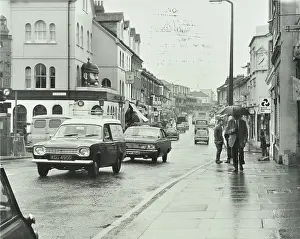 Umbrellas Prints: General view of Hoe Street, Walthamstow, London, 1972. Creator: Unknown