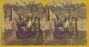 London Stereoscopic Photographic Co Prints: Genre scene: family seated outside around a table with glasses and a bottle of wine