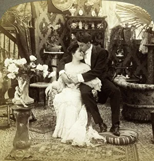 George Greatly Admires Ethels Beautiful Complexion. Artist: Underwood & Underwood