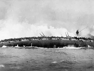 The german armoured cruiser SMS Blucher sinks after receiving multiple hits from British warships at Artist: Anonymous