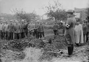 Burying Prints: German Field chaplain burying French Officer who died in hospital