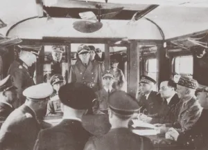 The German and French delegations inside a railroad car at Compiegne for the signing of Frances sur Artist: Anonymous The German and French delegations inside a railroad car at Compiegne for the signing of Frances sur Artist: Anonymous