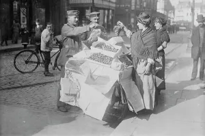 Buying Prints: German soldiers buying fruit, Belgium, 1915. Creator: Bain News Service