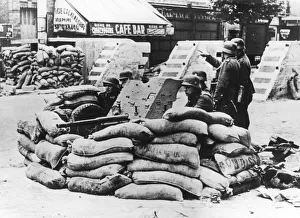 Barricade Collection: German soldiers with captured French barricade, near Paris, June 1940