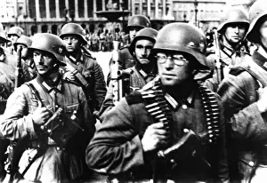 Conquering Gallery: German soldiers marching in Paris, 14 June 1940