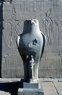 Giant statue of the Ancient Egyptian falcon-headed god Horus, Edfu, Egypt Giant statue of the Ancient Egyptian falcon-headed god Horus, Edfu, Egypt