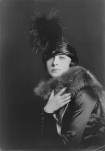 Throat Prints: Gilbert, J. Miss, portrait photograph, 1917 Sept. 29. Creator: Arnold Genthe