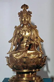 A gilt-bronze statuette of a Bodhisattva on a lotus leaf, 10th century A gilt-bronze statuette of a Bodhisattva on a lotus leaf, 10th century