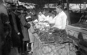 Ernest Flammarion Gallery: Gingerbread seller, Paris, 1931. Artist: Ernest Flammarion