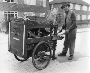 Sharpening Prints: Gipsy knife-grinder with his handcart, Horley, Surrey, 1964
