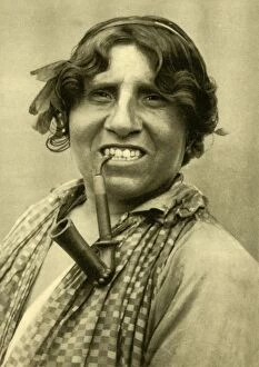 Gipsy Gallery: Gipsy woman smoking a pipe, Burgenland, Austria, c1935. Creator: Unknown