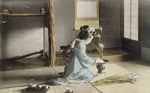 Customs Prints: Girl arranging flowers, 1890 s. Creator: Japanese Photographer (19th Century)
