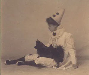 Pierrot Prints: Girl dressed in a pierrot costume with a small black dog on her lap