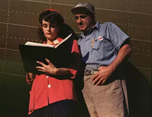 Girl inspector confers with a worker as she..., Douglas Aircraft Company, Long Beach, Calif., 1942